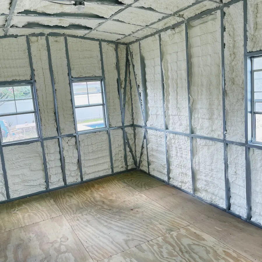 Closed-cell spray foam insulation applied to wall cavities in a residential project in Kalamazoo